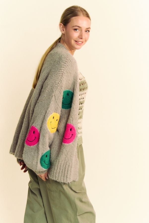 Fuzzy Smile Open Front Cardigan – Cozy & Playful in Gray Oats