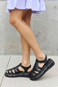 Platform Cage Strap Sandal in Black